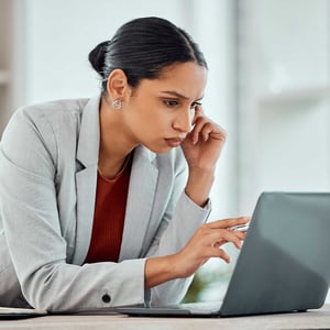 serious-concentrating-african-business-woman-reading-an-email